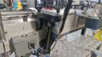 Etiquetadora automtica de doble cabezal para botellas planas Bauch Campos