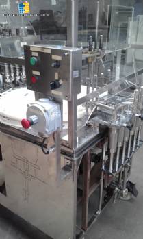 m�quina de llenado rotativa con 6 ca�os de acero inoxidable