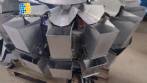M�quina envasadora a b�scula multicabezal Mqpack