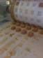 M�quina de moldeo rotativa para la producci�n de dulce de leche y otros productos alimenticios