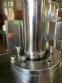Llenadora rotativa gravim�trica de acero inoxidable con cabina