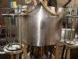 Rotary con 12 boquillas autom�ticas de llenado Wada