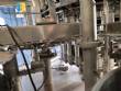 M�quina de llenado rotativa Zegla con sistema de enjuague y taponado de tres bloques