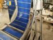 Elevador de posicionamiento y llenado de tapas para la industria de maquinaria SLP