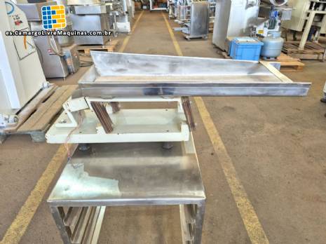 Canal vibratorio para báscula multicabezal