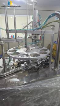 Máquina de llenado rotativa con unidad de taponado y sellado para vasos y tarros Mirainox para productos pastosos. Máquina de llenado rotativa con unidad de taponado y sellado para vasos y tarros Mirainox para productos pastosos.